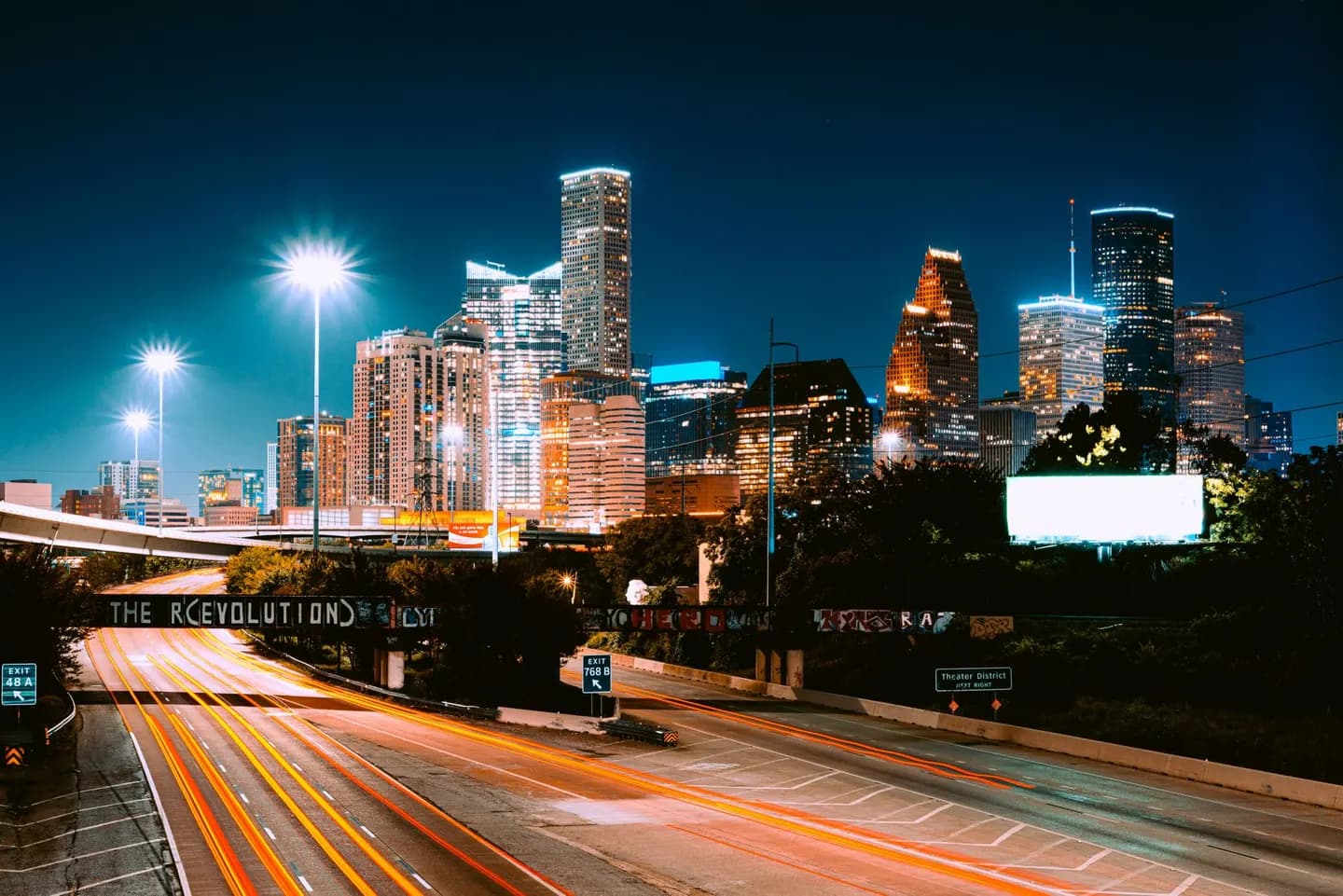The Houston skyline at night from the freeway